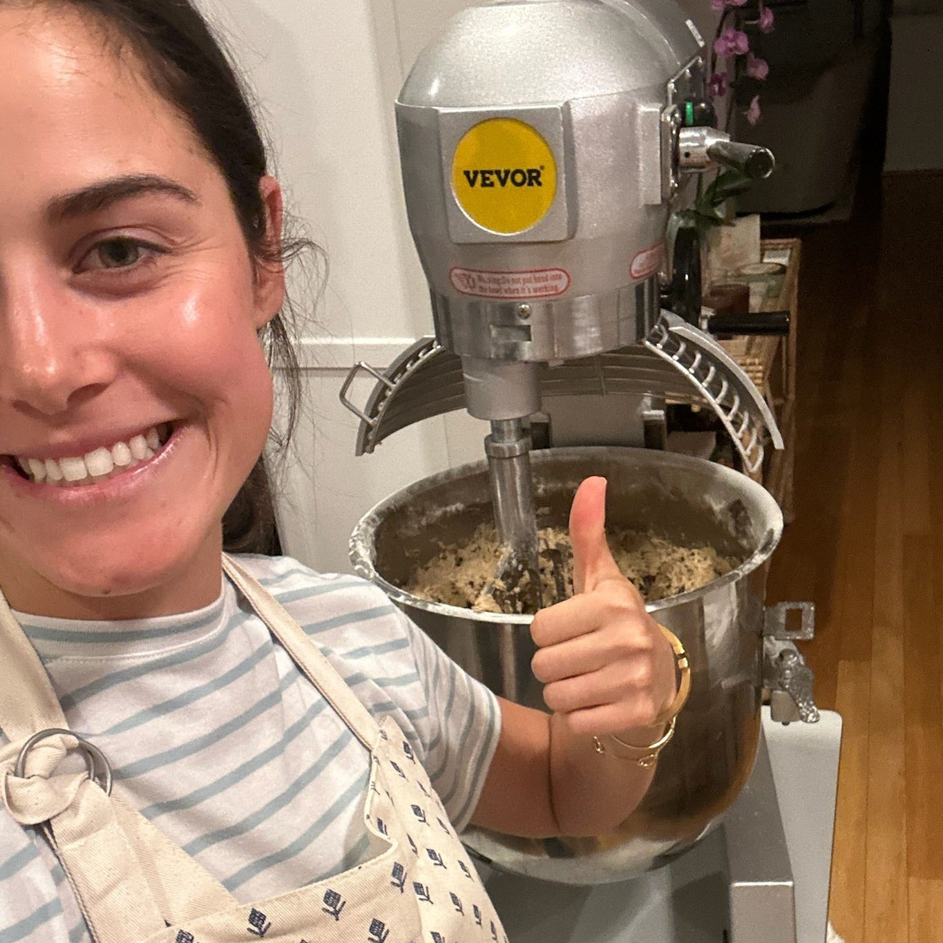 Marge giving a thumbs up in front of a Vevor mixer in a kitchen.